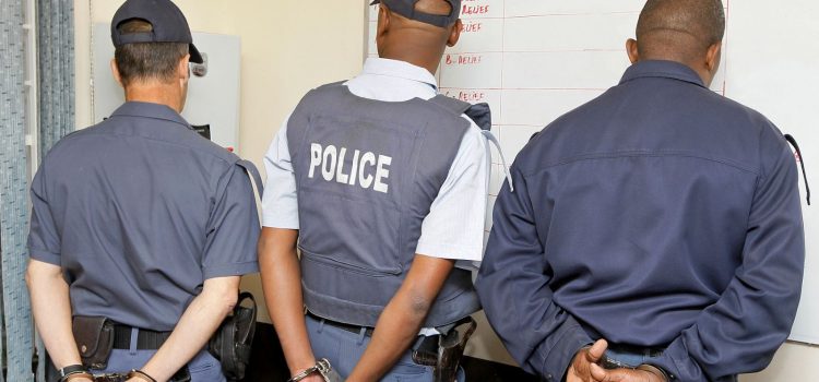 Two police officers arrested for soliciting a bribe from a suspect