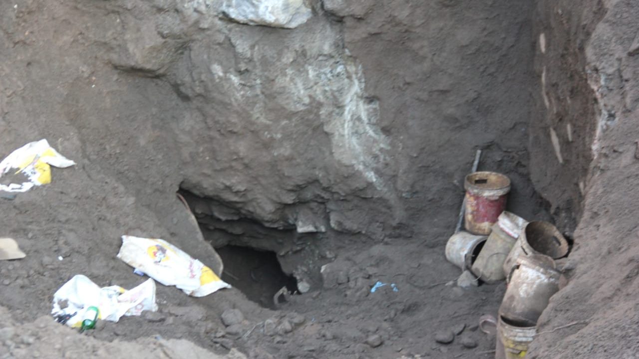 A hole dug for illegal miners